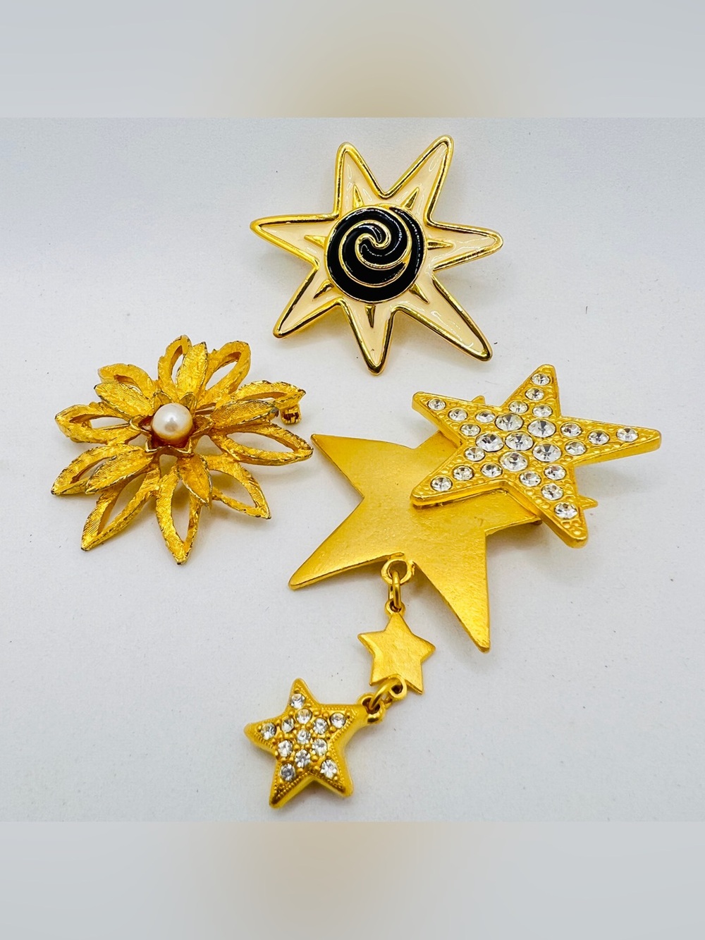 Vintage Goldtone Star and Floral Brooch Set
